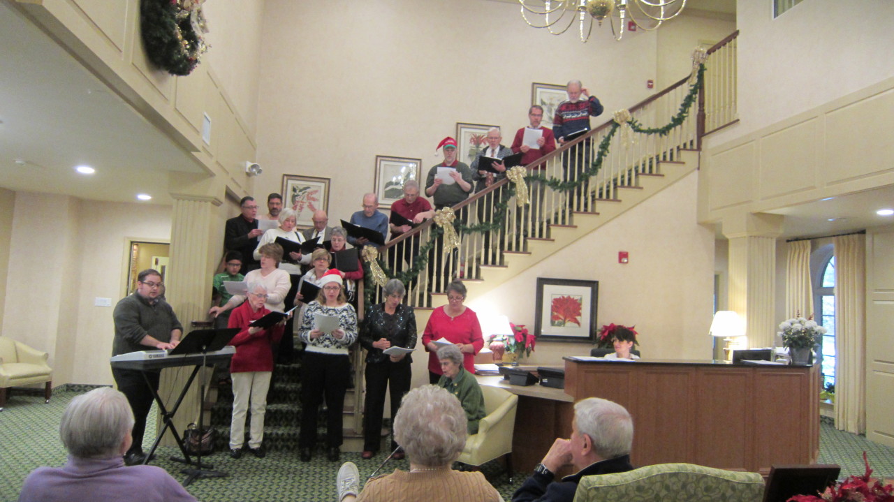 More Christmas Caroling brought by choir and parishioners to nursing home residents